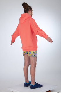 Nigel a-pose blue sneakers dressed floral printed shorts salmon hoodie…